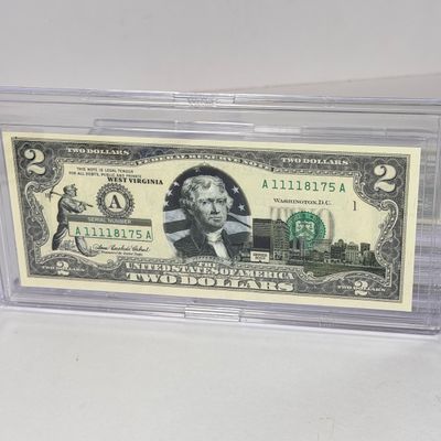 LOT 34: Collection of Ten Vintage $2 Bills with Aftermarket Art Depicting U.S. States in Cases - Florida, Alaska, New Jersey and More
