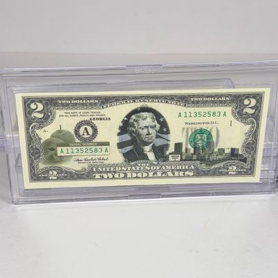 LOT 35: Collection of Ten Vintage $2 Bills with Aftermarket Art Depicting U.S. States in Cases - Wyoming, Oregon, Arizona and More