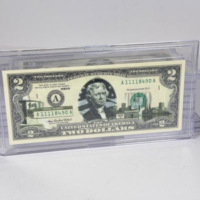 LOT 33: Collection of Ten Vintage $2 Bills with Aftermarket Art Depicting U.S. States in Cases - Ohio, Vermont, Indiana and More