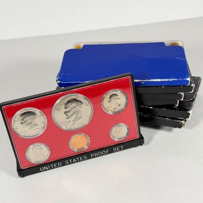 LOT 56: United States Mint Proof Sets - 1970s - Cases in Varrying Condition