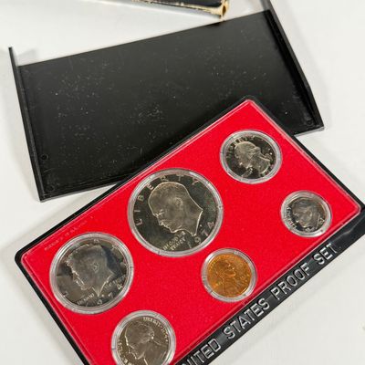 LOT 52: United States Mint Proof Sets - 1970s - Condition of Cases Varies