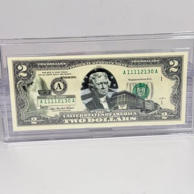 LOT 35: Collection of Ten Vintage $2 Bills with Aftermarket Art Depicting U.S. States in Cases - Wyoming, Oregon, Arizona and More