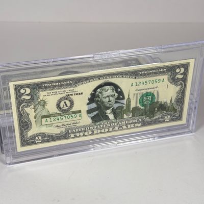 LOT 33: Collection of Ten Vintage $2 Bills with Aftermarket Art Depicting U.S. States in Cases - Ohio, Vermont, Indiana and More