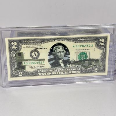LOT 31: Collection of Ten Vintage $2 Bills with Aftermarket Art Depicting U.S. States in Cases - Maine, Texas, New Mexico and More