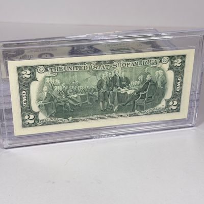 LOT 33: Collection of Ten Vintage $2 Bills with Aftermarket Art Depicting U.S. States in Cases - Ohio, Vermont, Indiana and More