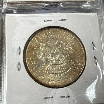 LOT 39: Collection of Kennedy Half Dollars - 40% Silver - 1966 through 1969 - in Collector Booklet