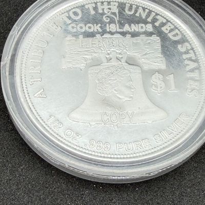 LOT 109: 2021 Cook Islands Morgan / Peace Dollar 100 Year Anniversary 1/2 Ounce .999 Fine Silver Commemorative Coin