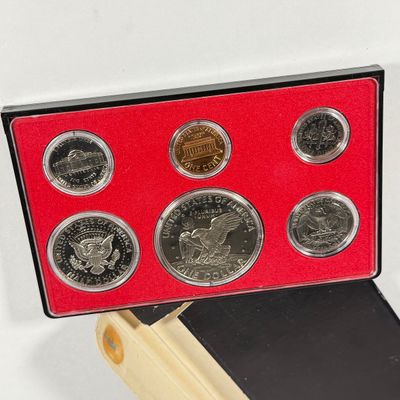 LOT 56: United States Mint Proof Sets - 1970s - Cases in Varrying Condition