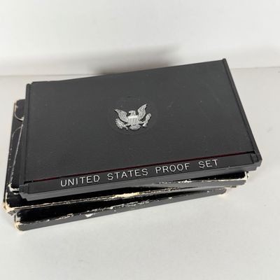 LOT 52: United States Mint Proof Sets - 1970s - Condition of Cases Varies