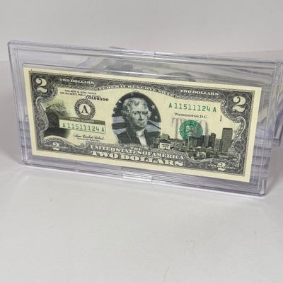 LOT 32: Collection of Ten Vintage $2 Bills with Aftermarket Art Depicting U.S. States in Cases - Colorado, Nevada and More
