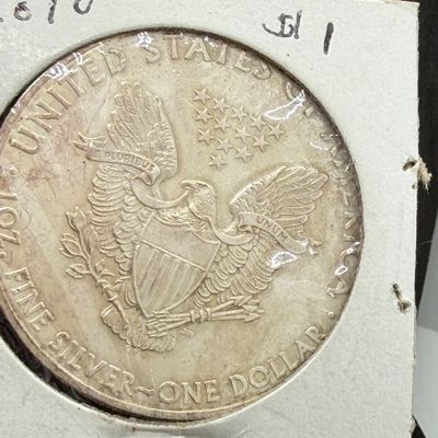 LOT 104: 2010 American Eagle Silver Dollar - 1 Ounce .999 Fine Silver Coin