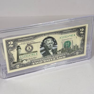 LOT 33: Collection of Ten Vintage $2 Bills with Aftermarket Art Depicting U.S. States in Cases - Ohio, Vermont, Indiana and More