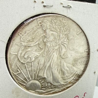 LOT 104: 2010 American Eagle Silver Dollar - 1 Ounce .999 Fine Silver Coin