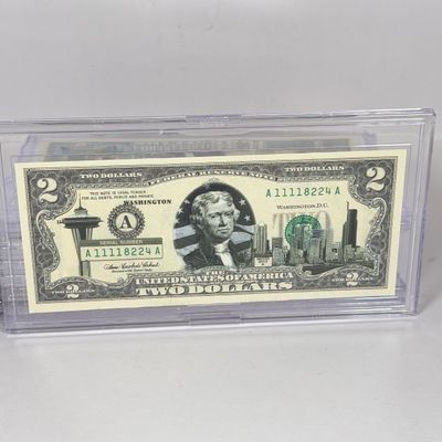 LOT 31: Collection of Ten Vintage $2 Bills with Aftermarket Art Depicting U.S. States in Cases - Maine, Texas, New Mexico and More