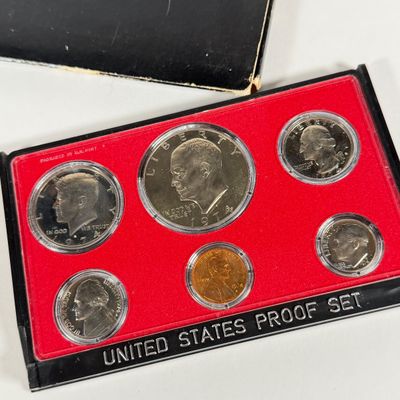 LOT 52: United States Mint Proof Sets - 1970s - Condition of Cases Varies