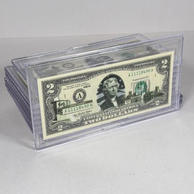 LOT 33: Collection of Ten Vintage $2 Bills with Aftermarket Art Depicting U.S. States in Cases - Ohio, Vermont, Indiana and More