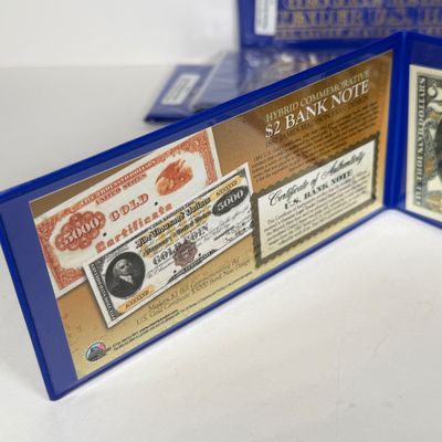 LOT 41: Hybrid $2 Bill w. Commemorative Art Overlays in Cases w/ Certificates from Merrick Mint (4)