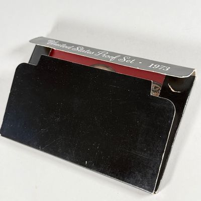 LOT 56: United States Mint Proof Sets - 1970s - Cases in Varrying Condition