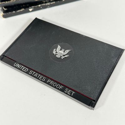 LOT 52: United States Mint Proof Sets - 1970s - Condition of Cases Varies