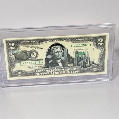 LOT 31: Collection of Ten Vintage $2 Bills with Aftermarket Art Depicting U.S. States in Cases - Maine, Texas, New Mexico and More