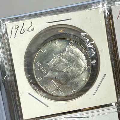 LOT 39: Collection of Kennedy Half Dollars - 40% Silver - 1966 through 1969 - in Collector Booklet
