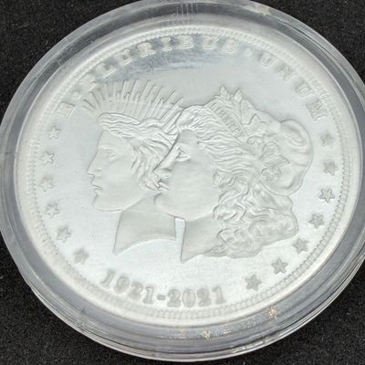 LOT 109: 2021 Cook Islands Morgan / Peace Dollar 100 Year Anniversary 1/2 Ounce .999 Fine Silver Commemorative Coin