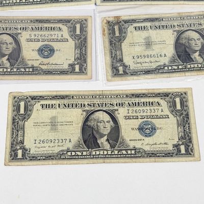LOT 7: One Dollar Silver Certificate Bills (9) 1957