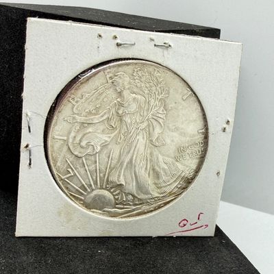 LOT 104: 2010 American Eagle Silver Dollar - 1 Ounce .999 Fine Silver Coin