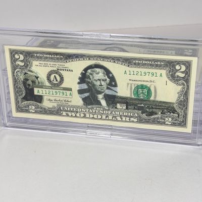 LOT 34: Collection of Ten Vintage $2 Bills with Aftermarket Art Depicting U.S. States in Cases - Florida, Alaska, New Jersey and More