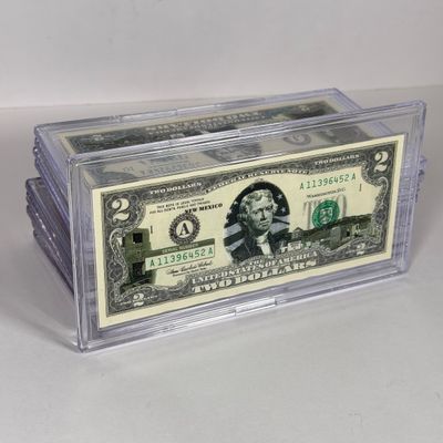 LOT 31: Collection of Ten Vintage $2 Bills with Aftermarket Art Depicting U.S. States in Cases - Maine, Texas, New Mexico and More