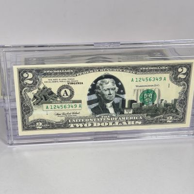 LOT 31: Collection of Ten Vintage $2 Bills with Aftermarket Art Depicting U.S. States in Cases - Maine, Texas, New Mexico and More