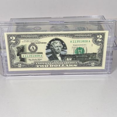 LOT 31: Collection of Ten Vintage $2 Bills with Aftermarket Art Depicting U.S. States in Cases - Maine, Texas, New Mexico and More