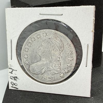 LOT 99: 1824 Capped Bust Silver Dollar US Coin - 90% silver