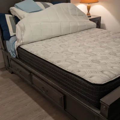 Sale Photo Thumbnail #24: Modern dark gray wooden sleigh bed frame featuring built-in under-bed storage drawers, shown with a mattress and bedding.