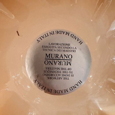 Sale Photo Thumbnail #58: Authenticity label on the base of a Murano art glass piece, reading "Hand Made in Italy" and "Lavorazione Eseguita Secondo La Tecnica Dei Maestri Murano."