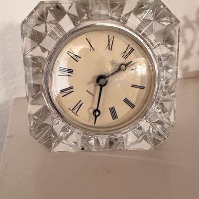 Sale Photo Thumbnail #14: Vintage Mikasa West Germany quartz desk clock, featuring a square, heavy cut-crystal frame and a cream-colored face with Roman numerals.