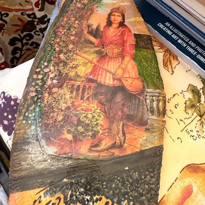 Sale Photo Thumbnail #5: Persian-style decoupage art on a natural wood slab, depicting a woman in traditional attire holding an instrument, with Persian calligraphy at the bottom.