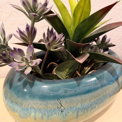 Sale Photo Thumbnail #56: Faux succulent arrangement in a glazed ceramic planter with a blue and green drip glaze finish.