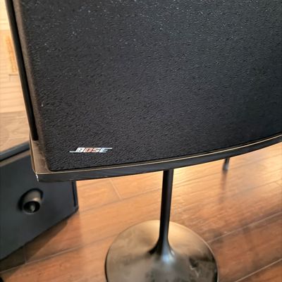 Sale Photo Thumbnail #62: Vintage Bose 901 Series speaker with black grille cloth, mounted on a matching black tulip pedestal stand.
