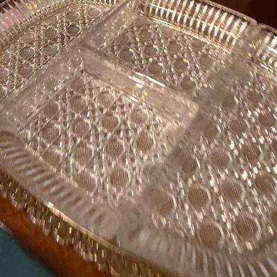 Sale Photo Thumbnail #52: Vintage pressed clear glass divided serving tray featuring a cane-weave pattern and fluted edges.