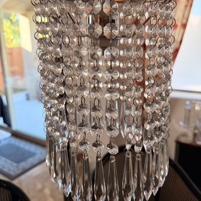 Sale Photo Thumbnail #67: Modern crystal beaded mini chandelier with a chrome frame and hanging teardrop prisms.