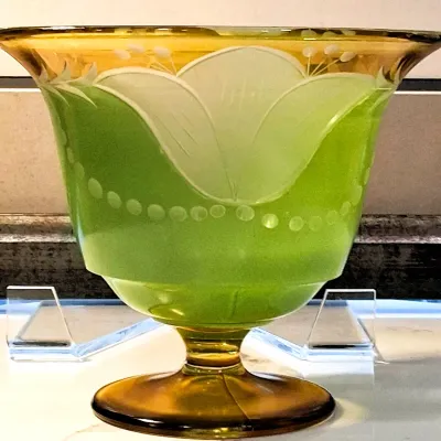 Tiffin Glass Company green satin glass footed vase featuring an etched floral design with amber-toned rim and base, circa 1930s.