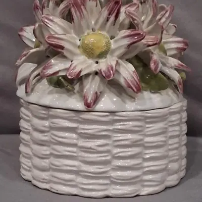 Vintage Italian ceramic trinket box featuring a white basketweave base and a lid adorned with dimensional, hand-painted pink and white...