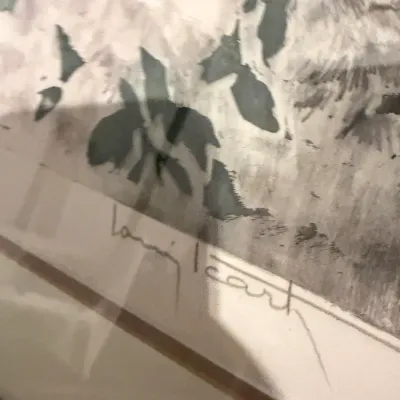 Sale Photo Thumbnail #180: Close-up of a framed artwork featuring the signature of French Art Deco artist Louis Icart.