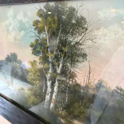 Sale Photo Thumbnail #102: Framed landscape print featuring birch trees and a soft, pastel-toned sky, housed in a dark stained wooden frame under glass.