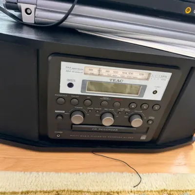 TEAC GF-350 multi music player and CD recorder with AM/FM radio, housed in a black wooden cabinet with integrated side speakers.