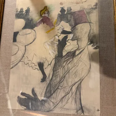 Sale Photo Thumbnail #200: Framed sketch in the style of Henri de Toulouse-Lautrec, depicting a Parisian nightlife scene with a man in a top hat, presented in a gold-finished frame with a linen mat.