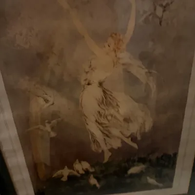 Sale Photo Thumbnail #218: Framed Louis Icart print titled 'L'Elan', depicting a wind-swept woman with birds in an Art Deco style, presented under glass in a dark frame.