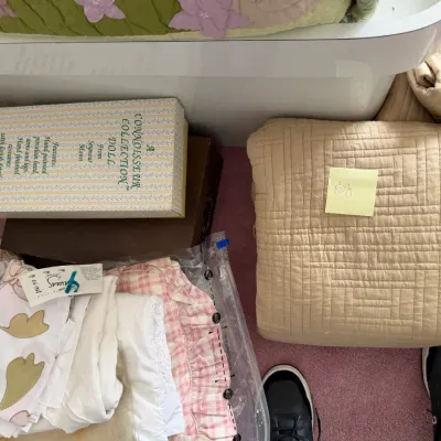 Sale Photo Thumbnail #106: Assorted bedding and linens, including a beige quilted king-size coverlet and a boxed Seymour Mann Connoisseur Collection doll.
