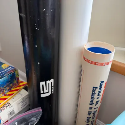 Three vintage cardboard mailing and storage tubes, including one featuring Bill Gallo sports cartoonist branding.